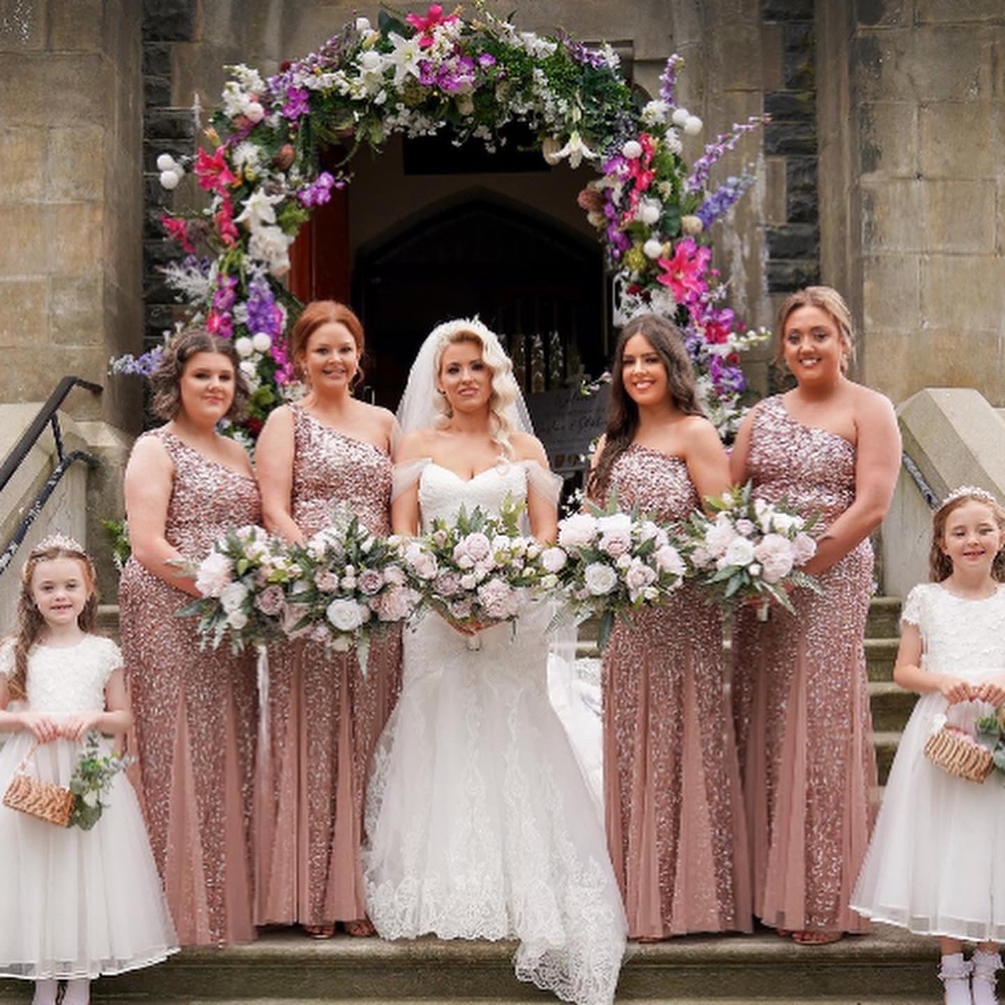 Bridal party outside a ceremony.